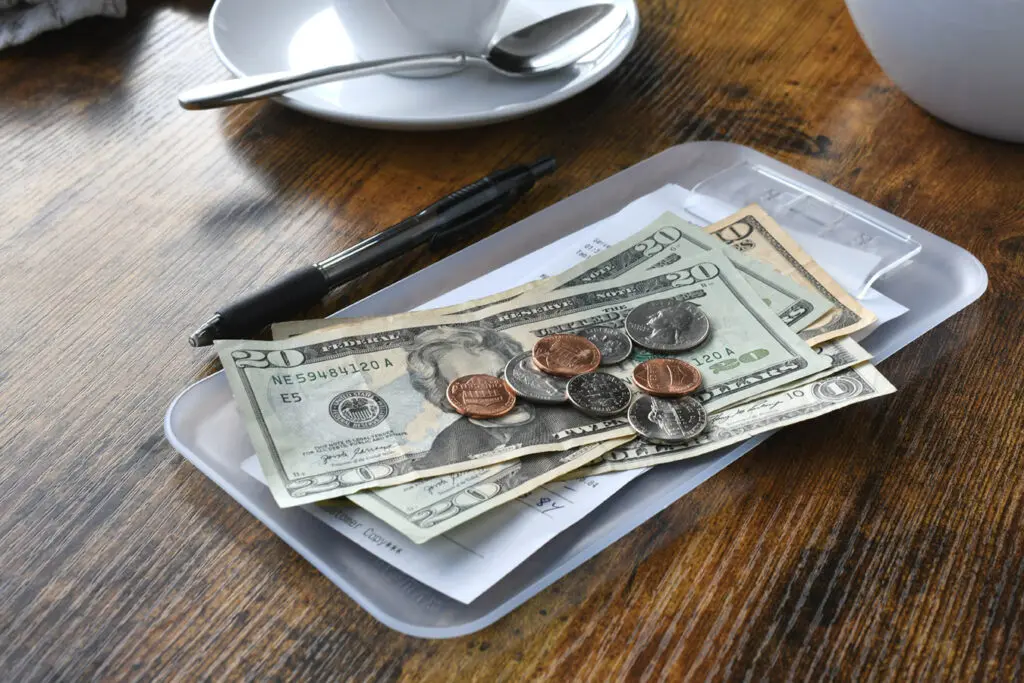 Leaving a Tip for a Waiter with Cash